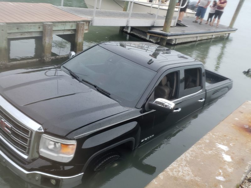 GMC brand car in the fell in the water isometric view