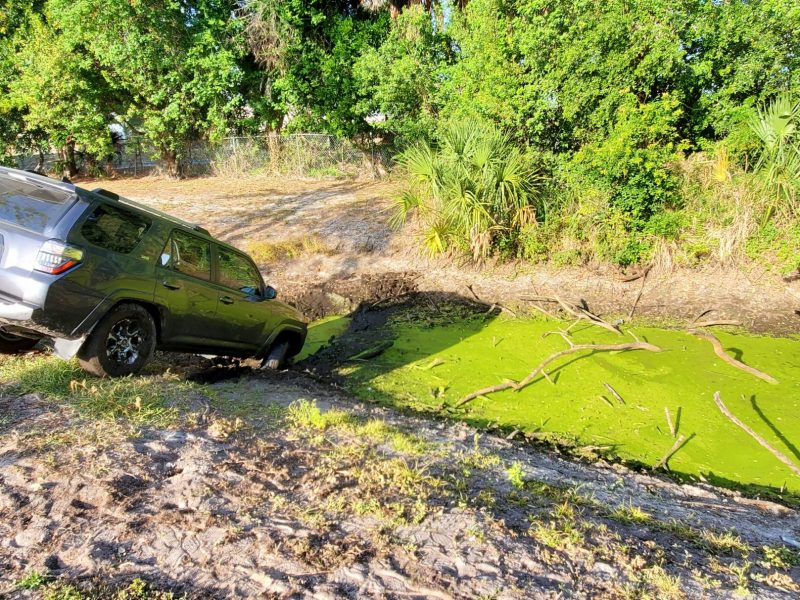 Toyota car stuck in the mossy mud